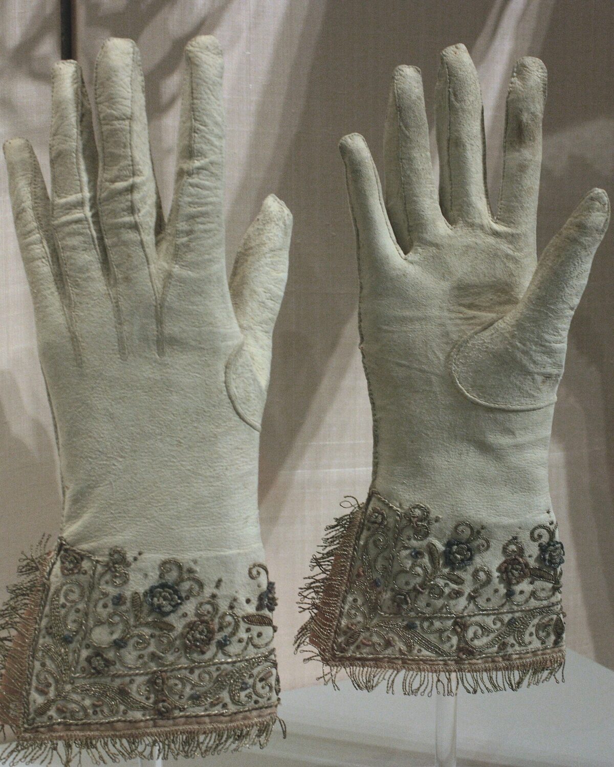 Antique white opera gloves with delicate embroidered gauntlet cuffs
