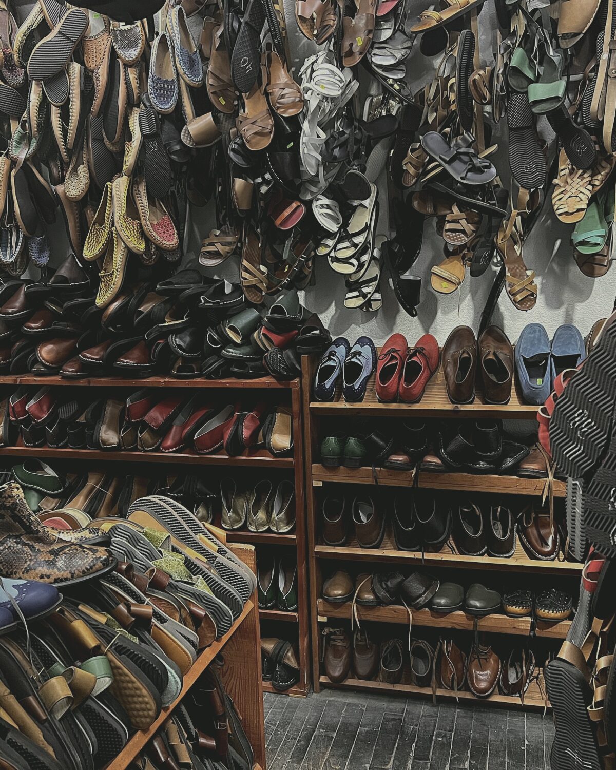 Shelves of gloves and leather goods in the showroom